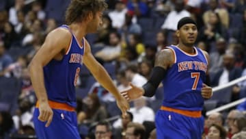 Oct 9, 2015; Washington, DC, USA; New York Knicks forward Carmelo Anthony (7) celebrates with New York Knicks center Robin Lopez (8) against the Washington Wizards in the third quarter at Verizon Center. The Knicks won 115-104. Mandatory Credit: Geoff Burke-USA TODAY Sports