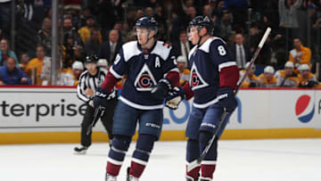 DENVER, COLORADO - NOVEMBER 07: Nathan MacKinnon #29 of the Colorado Avalanche celebrates a goal against the Nashville Predators with teammate Cale Makar #8 at Pepsi Center on November 07, 2019 in Denver, Colorado. (Photo by Michael Martin/NHLI via Getty Images)