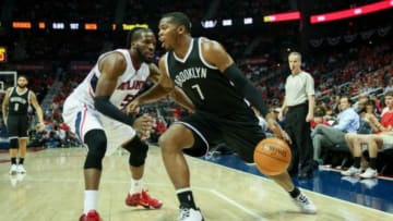 Apr 22, 2015; Atlanta, GA, USA; Atlanta Hawks forward DeMarre Carroll (5) defends Brooklyn Nets forward Joe Johnson (7) during the first quarter of game two of the first round of the NBA Playoffs at Philips Arena. Mandatory Credit: Kevin Liles-USA TODAY Sports