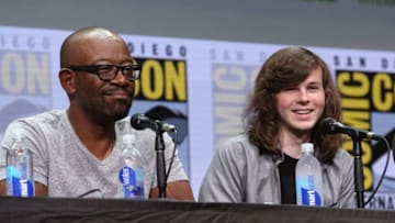 SAN DIEGO, CA - JULY 21: Actors Lennie James (L) and Chandler Riggs from 'The Walking Dead' at the Hall H panel with AMC at San Diego Comic-Con International 2017 at the San Diego Convention Center on July 21, 2017 in San Diego, California. (Photo by Jesse Grant/Getty Images for AMC)