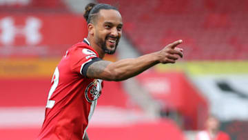 Southampton's English midfielder Theo Walcott celebrates scoring his team's third goal during the English Premier League football match between Southampton and Fulham at St Mary's Stadium in Southampton, southern England on May 15, 2021. - RESTRICTED TO EDITORIAL USE. No use with unauthorized audio, video, data, fixture lists, club/league logos or 'live' services. Online in-match use limited to 120 images. An additional 40 images may be used in extra time. No video emulation. Social media in-match use limited to 120 images. An additional 40 images may be used in extra time. No use in betting publications, games or single club/league/player publications. (Photo by PETER CZIBORRA / POOL / AFP) / RESTRICTED TO EDITORIAL USE. No use with unauthorized audio, video, data, fixture lists, club/league logos or 'live' services. Online in-match use limited to 120 images. An additional 40 images may be used in extra time. No video emulation. Social media in-match use limited to 120 images. An additional 40 images may be used in extra time. No use in betting publications, games or single club/league/player publications. / RESTRICTED TO EDITORIAL USE. No use with unauthorized audio, video, data, fixture lists, club/league logos or 'live' services. Online in-match use limited to 120 images. An additional 40 images may be used in extra time. No video emulation. Social media in-match use limited to 120 images. An additional 40 images may be used in extra time. No use in betting publications, games or single club/league/player publications. (Photo by PETER CZIBORRA/POOL/AFP via Getty Images)