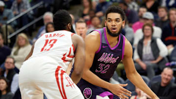 MINNEAPOLIS, MN - FEBRUARY 13: James Harden #13 of the Houston Rockets defends against Karl-Anthony Towns #32 of the Minnesota Timberwolves. (Photo by Hannah Foslien/Getty Images)