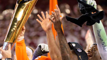SANTA CLARA, CA - JANUARY 07: Head Coach Dabo Swinney of the Clemson Tigers celebrates with his team after defeating the Alabama Crimson Tide during the College Football Playoff National Championship held at Levi's Stadium on January 7, 2019 in Santa Clara, California. The Clemson Tigers defeated the Alabama Crimson Tide 44-16. (Photo by Jamie Schwaberow/Getty Images)