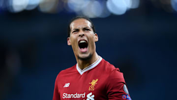 MANCHESTER, ENGLAND - APRIL 10: Virgil van Dijk of Liverpool celebrates his sides victory after the UEFA Champions League Quarter Final Second Leg match between Manchester City and Liverpool at Etihad Stadium on April 10, 2018 in Manchester, England. (Photo by Laurence Griffiths/Getty Images,)