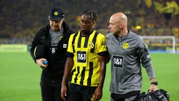 DORTMUND, GERMANY - SEPTEMBER 02: Jamie Jermaine Bynoe-Gittens of Borussia Dortmund leaves the pitch injured during the Bundesliga match between Borussia Dortmund and TSG Hoffenheim at Signal Iduna Park on September 02, 2022 in Dortmund, Germany. (Photo by Alex Grimm/Getty Images)
