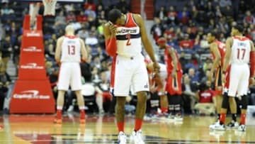 Feb 23, 2016; Washington, DC, USA; Washington Wizards guard John Wall (2) reacts against the New Orleans Pelicans during the first half at Verizon Center. Mandatory Credit: Brad Mills-USA TODAY Sports