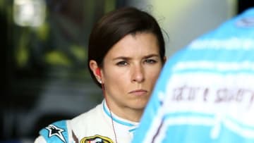 Jun 10, 2016; Brooklyn, MI, USA; Sprint Cup Series driver Danica Patrick (10) stands in the garage during practice for the FireKeepers Casino 400 at Michigan International Speedway. Mandatory Credit: Aaron Doster-USA TODAY Sports