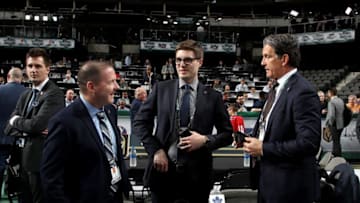 John Lilley, Kyle Dubas and Brendan Shanahan of the Toronto Maple Leafs. (Photo by Bruce Bennett/Getty Images)