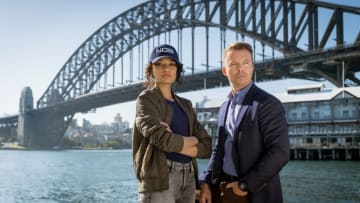 BTS of Olivia Swann as NCIS Special Agent Captain Michelle Mackey and Todd Lasance as AFP Liaison Officer Sergeant Jim  'JD' Dempsey, on the set of NCIS: Sydney season 1. PHOTO CREDIT: Daniel Asher Smith/Paramount+   © TM & © 2023 CBS Studios Inc. NCIS: Sydney and related marks and logos are trademarks of CBS Studios Inc. All Rights Reserved.