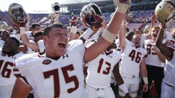 LOUISVILLE, KY - OCTOBER 14: Boston College Eagles players celebrate after a 45-42 win over the Louisville Cardinals in a game at Papa John's Cardinal Stadium on October 14, 2017 in Louisville, Kentucky. (Photo by Joe Robbins/Getty Images)