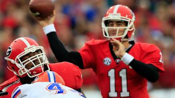 JACKSONVILLE, FL - OCTOBER 27: Aaron Murray #11 of the Georgia Bulldogs attempts a pass during the game against the Florida Gators at EverBank Field on October 27, 2012 in Jacksonville, Florida. (Photo by Sam Greenwood/Getty Images)