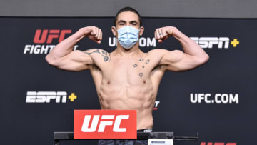 LAS VEGAS, NEVADA - APRIL 16: In this UFC handout, Robert Whittaker of Australia poses on the scale during the UFC weigh-in at UFC APEX on April 16, 2021 in Las Vegas, Nevada. (Photo by Chris Unger/Zuffa LLC/Getty Images)