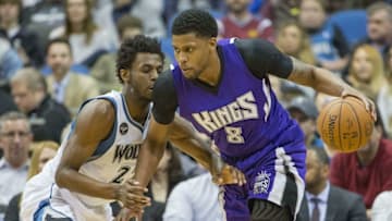 Mar 23, 2016; Minneapolis, MN, USA; Sacramento Kings forward Rudy Gay (8) dribbles the ball around Minnesota Timberwolves guard Andrew Wiggins (22) in the second half at Target Center. The Timberwolves won 113-104. Mandatory Credit: Jesse Johnson-USA TODAY Sports