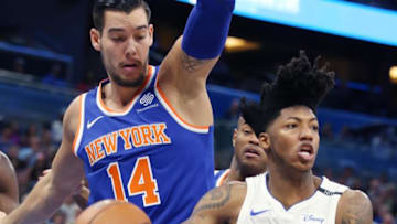The Orlando Magic's Elfrid Payton (2) passes in front of the New York Knicks' Willy Hermangomez (14) at the Amway Center in Orlando, Fla., on Wednesday, Nov. 8, 2017. The Magic won, 112-99. (Stephen M. Dowell/Orlando Sentinel/TNS via Getty Images)
