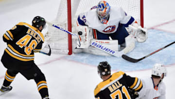 May 31, 2021; Boston, Massachusetts, USA; New York Islanders goaltender Semyon Varlamov (40) makes a save against Boston Bruins center David Krejci (46) during the second period in game two of the second round of the 2021 Stanley Cup Playoffs at TD Garden. Mandatory Credit: Bob DeChiara-USA TODAY Sports