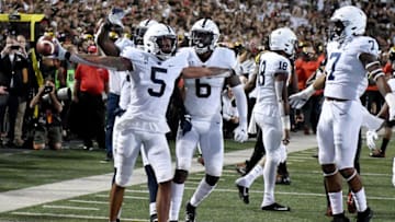 COLLEGE PARK, MD - SEPTEMBER 27: Tariq Castro-Fields #5 of the Penn State Nittany Lions celebrates after making and interception against the Maryland Terrapins at Maryland Stadium on September 27, 2019 in College Park, Maryland. (Photo by G Fiume/Maryland Terrapins/Getty Images)