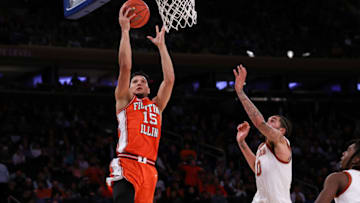 NEW YORK, NEW YORK - DECEMBER 06: RJ Melendez #15 of the Illinois Fighting Illini goes up for a layup during the second half of the game against the Texas Longhorns at Madison Square Garden on December 06, 2022 in New York City. (Photo by Dustin Satloff/Getty Images)