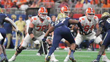 Clemson offensive lineman Blake Miller (78) and offensive lineman Walker Parks (64) block during the third quarter at the Mercedes-Benz Stadium in Atlanta, Georgia Monday, September 5, 2022.Ncaa Fb Clemson At Georgia Tech