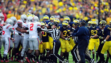Nov 26, 2011; Ann Arbor, MI, USA; Members of the Ohio State Buckeyes and Michigan Wolverines get in a fight during the first quarter at Michigan Stadium. Mandatory Credit: Andrew Weber-USA TODAY Sports