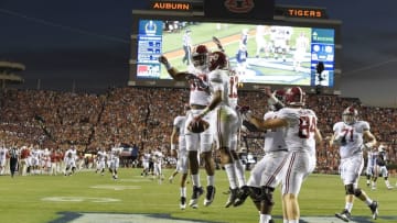 Nov 28, 2015; Auburn, AL, USA; Alabama Crimson Tide wide receiver ArDarius Stewart (13) celebrates with O.J. Howard (88) after catching a touchdown pass against the Auburn Tigers in the third quarter at Jordan Hare Stadium. Mandatory Credit: RVR Photos-USA TODAY Sports