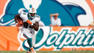 MIAMI - SEPTEMBER 16: Wide receiver Chris Chambers #84 of the Miami Dolphins runs the ball down field against the Dallas Cowboys at Dolphin Stadium on September 16, 2007 in Miami, Florida. The Cowboys defeated the Dolphins 37-20. (Photo by Allen Kee/Getty Images)