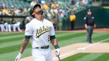 May 21, 2016; Oakland, CA, USA; Oakland Athletics left fielder Khris Davis (2) reacts after striking out against the New York Yankees during the fifth inning at O.co Coliseum. The New York Yankees defeated the Oakland Athletics 5-1. Mandatory Credit: Ed Szczepanski-USA TODAY Sports