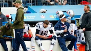 NASHVILLE, TN - NOVEMBER 11: Tom Brady #12 of the New England Patriots rests on the sideline during the fourth quarter against the Tennessee Titans at Nissan Stadium on November 11, 2018 in Nashville, Tennessee. (Photo by Frederick Breedon/Getty Images)