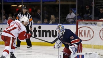 Apr 9, 2016; New York, NY, USA; Detroit Red Wings center Luke Glendening (41) has his shot stopped by New York Rangers goalie Antti Raanta (32) during the third period at Madison Square Garden. The Rangers defeated the Red Wings 3-2. Mandatory Credit: Adam Hunger-USA TODAY Sports