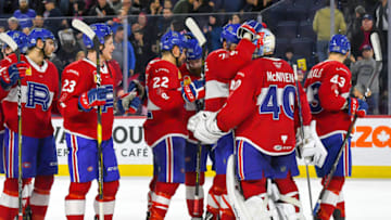 LAVAL, QC, CANADA - FEBRUARY 22: Michael McNiven #40 of the Laval Rocket being congradulated by teammates after his shutout against the Manitoba Moose at Place Bell on February 22, 2019 in Laval, Quebec. (Photo by Stephane Dube /Getty Images)