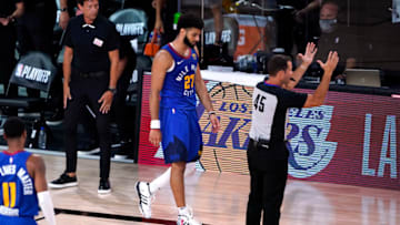 LAKE BUENA VISTA, FLORIDA - AUGUST 23: Jamal Murray #27 of the Denver Nuggets walks back to the bench after Game Four between the Denver Nuggets and the Utah Jazz of the first round of the playoffs at the AdventHealth Arena at the ESPN Wide World Of Sports Complex on August 22, 2020 in Lake Buena Vista, Florida. NOTE TO USER: User expressly acknowledges and agrees that, by downloading and or using this photograph, User is consenting to the terms and conditions of the Getty Images License Agreement. (Photo by Ashley Landis-Pool/Getty Images)