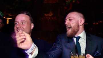 LAS VEGAS, NV - AUGUST 20: Mixed martial artist Conor McGregor (R) celebrates his UFC 202 victory during the official after-fight party at Intrigue Nightclub at Wynn Las Vegas on August 20, 2016 in Las Vegas, Nevada. (Photo by David Becker/Getty Images for Wynn Las Vegas)