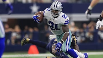 ARLINGTON, TX - OCTOBER 01: Ezekiel Elliott #21 of the Dallas Cowboys runs the ball in the fourth quarter against the Los Angeles Rams at AT&T Stadium on October 1, 2017 in Arlington, Texas. (Photo by Ronald Martinez/Getty Images)