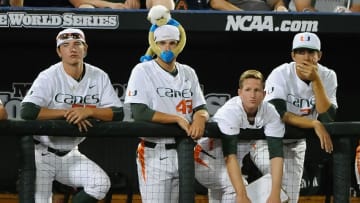 Jun 17, 2015; Omaha, NE, USA; Miami Hurricanes pitcher Thomas Woodrey (43) tries to invoke the rally monkey against the Florida Gators in the 2015 College World Series at TD Ameritrade Park. The Gators won 10-2. Mandatory Credit: Steven Branscombe-USA TODAY Sports