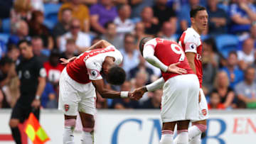 CARDIFF, WALES - SEPTEMBER 02: Alexandre Lacazette of Arsenal (9) celebrates with Pierre-Emerick Aubameyang as he scores his team's third goal during the Premier League match between Cardiff City and Arsenal FC at Cardiff City Stadium on September 2, 2018 in Cardiff, United Kingdom. (Photo by Catherine Ivill/Getty Images)