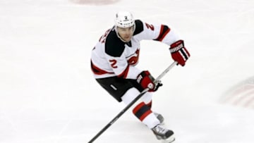 Dec 2, 2014; Pittsburgh, PA, USA; New Jersey Devils defenseman Marek Zidlicky (2) handles the puck against the Pittsburgh Penguins during the second period at the CONSOL Energy Center. The Penguins won 1-0. Mandatory Credit: Charles LeClaire-USA TODAY Sports