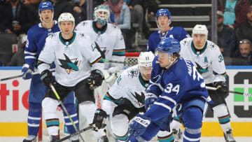 Andrew Cogliano #11 of the San Jose Sharks to contain Auston Matthews #34 of the Toronto Maple Leafs. (Photo by Claus Andersen/Getty Images)