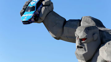 DOVER, DE - SEPTEMBER 30: Miles the Monster holds the #43 Smithfield Ford in the fanzone during practice for the Monster Energy NASCAR Cup Series Apache Warrior 400 presented by Lucas Oil at Dover International Speedway on September 30, 2017 in Dover, Delaware. (Photo by Jerry Markland/Getty Images)