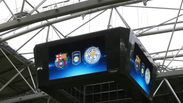 FC Barcelona, Leicester City badges (Photo by Catherine Ivill - AMA/Getty Images)