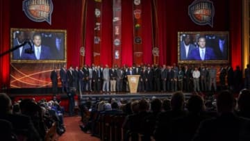 Sep 11, 2015; Springfield, MA, USA; John Calipari, surrounded by his players, speaks during the 2015 Naismith Memorial Basketball Hall of Fame Enshrinement Ceremony at Springfield Symphony Hall. Mandatory Credit: David Butler II-USA TODAY Sports