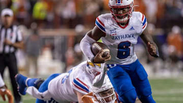 Kansas quarterback Jalon Daniels (6) carries the ball forward in overtime during the game against the Kansas Jayhawks on Saturday, Nov. 13, 2021. Kansas won 57-56 in overtime.Mlc Ut V Kansas 2509