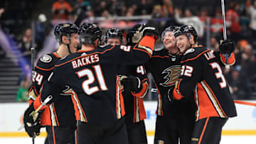 David Backes #21, Jacob Larsson #32, Carter Rowney #24, and Michael Del Zotto #44 congratulate Nicolas Deslauriers #20 of the Anaheim Duck (Photo by Sean M. Haffey/Getty Images)