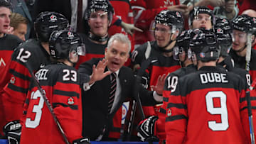 BUFFALO, NY - JANUARY 5: Dominique Ducharme head coach of Canada talks to the team late in the game during the Gold medal game against Sweden of the IIHF World Junior Championship at KeyBank Center on January 5, 2018 in Buffalo, New York. Canada beat Sweden 3-1. (Photo by Kevin Hoffman/Getty Images)