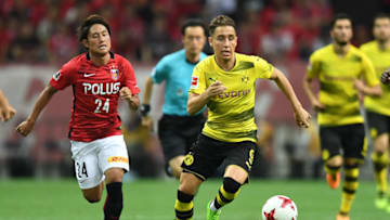 SAITAMA, JAPAN - JULY 15: Emre Mor of Borussia Dortmund runs with the ball during the preseason friendly match between Urawa Red Diamonds and Borussia Dortmund at Saitama Stadium on July 15, 2017 in Saitama, Japan. (Photo by Atsushi Tomura/Getty Images)