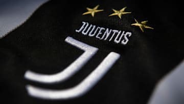 MANCHESTER, ENGLAND - MAY 06: The Juventus club crest on the first team home shirt displayed on May 6, 2020 in Manchester, England (Photo by Visionhaus)