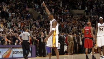 LOS ANGELES - JANUARY 22: Kobe Bryant #8 of the Los Angeles Lakers points in the air in a game he scored 81 points in against the Toronto Raptors on January 22, 2006 at Staples Center in Los Angeles, California. NOTE TO USER: User expressly acknowledges and agrees that, by downloading and/or using this Photograph, user is consenting to the terms and conditions of the Getty Images License Agreement. Mandatory Copyright Notice: Copyright 2006 NBAE (Photo by Noah Graham/NBAE via Getty Images)