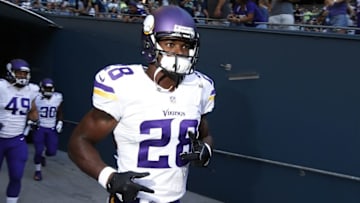 Aug 18, 2016; Seattle, WA, USA; Minnesota Vikings running back Adrian Peterson (28) runs out of the locker room for pre game warmups against the Seattle Seahawks at CenturyLink Field. Mandatory Credit: Joe Nicholson-USA TODAY Sports
