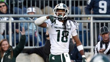 Oct 13, 2018; University Park, PA, USA; Michigan State Spartans wide receiver Felton Davis III (18) reacts after scoring a touchdown during the third quarter against the Penn State Nittany Lions at Beaver Stadium. Michigan State defeated Penn State 21-17. Mandatory Credit: Matthew O'Haren-USA TODAY Sports