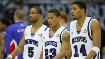 SAN ANTONIO - APRIL 07: Chris Douglas-Roberts #14, Derrick Rose #23 and Antonio Anderson #5 of the Memphis Tigers walk off the court in the second half against the Kansas Jayhawks during the 2008 NCAA Men's National Championship game at the Alamodome on April 7, 2008 in San Antonio, Texas. (Photo by Streeter Lecka/Getty Images)