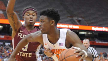 Feb 11, 2016; Syracuse, NY, USA; Syracuse Orange guard Franklin Howard (1) dribes the ball past Florida State Seminoles guard Benji Bell (3) during the second half of a game at the Carrier Dome.Syracuse won 85-72. Mandatory Credit: Mark Konezny-USA TODAY Sports