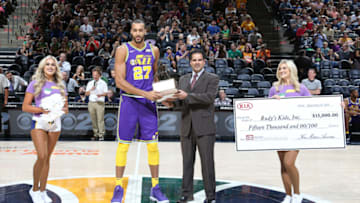 SALT LAKE CITY, UT - SEPTEMBER 28: Rudy Robert #27 of of the Utah Jazz receives his defensive player of the year award during the meet the team event at vivint.SmartHome Arena on September 28, 2018 in Salt Lake City, Utah. Copyright 2018 NBAE (Photo by Melissa Majchrzak/NBAE via Getty Images) Rudy Gobert